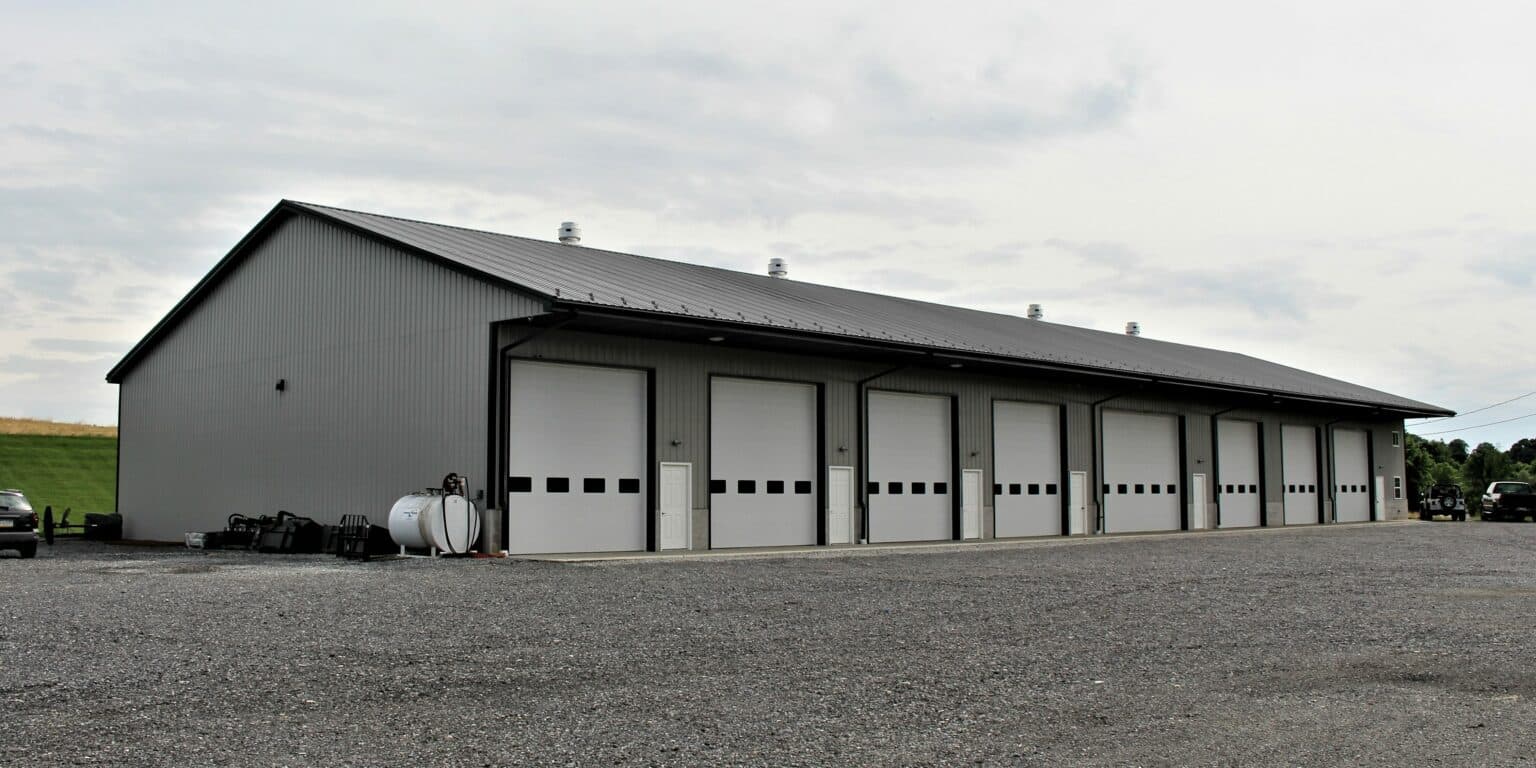garage with ash gray metal siding and metal charcoal roof in willow street