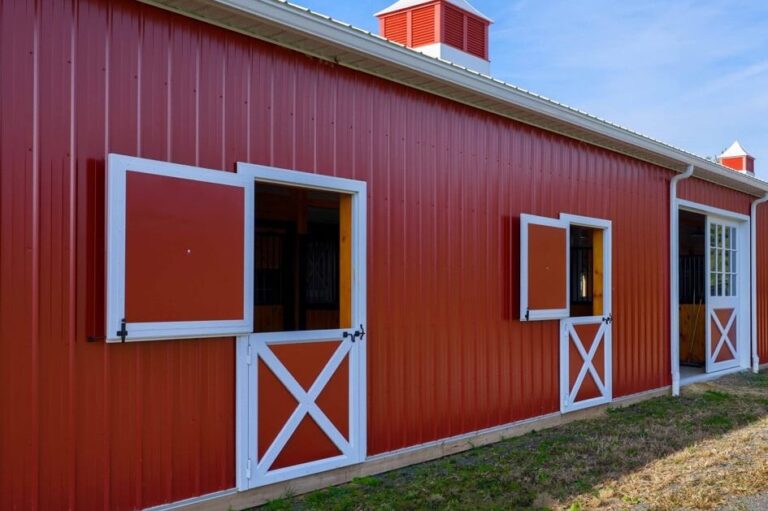 Red Wagler Panel metal siding on a large barn in Delaware near Camden