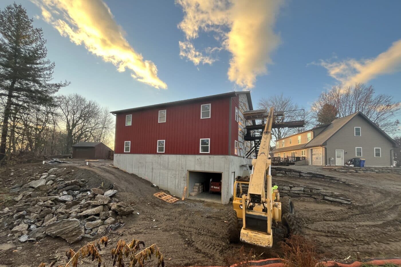 Rural red Paradise Panel metal siding on a new building project, near Dover, Delaware