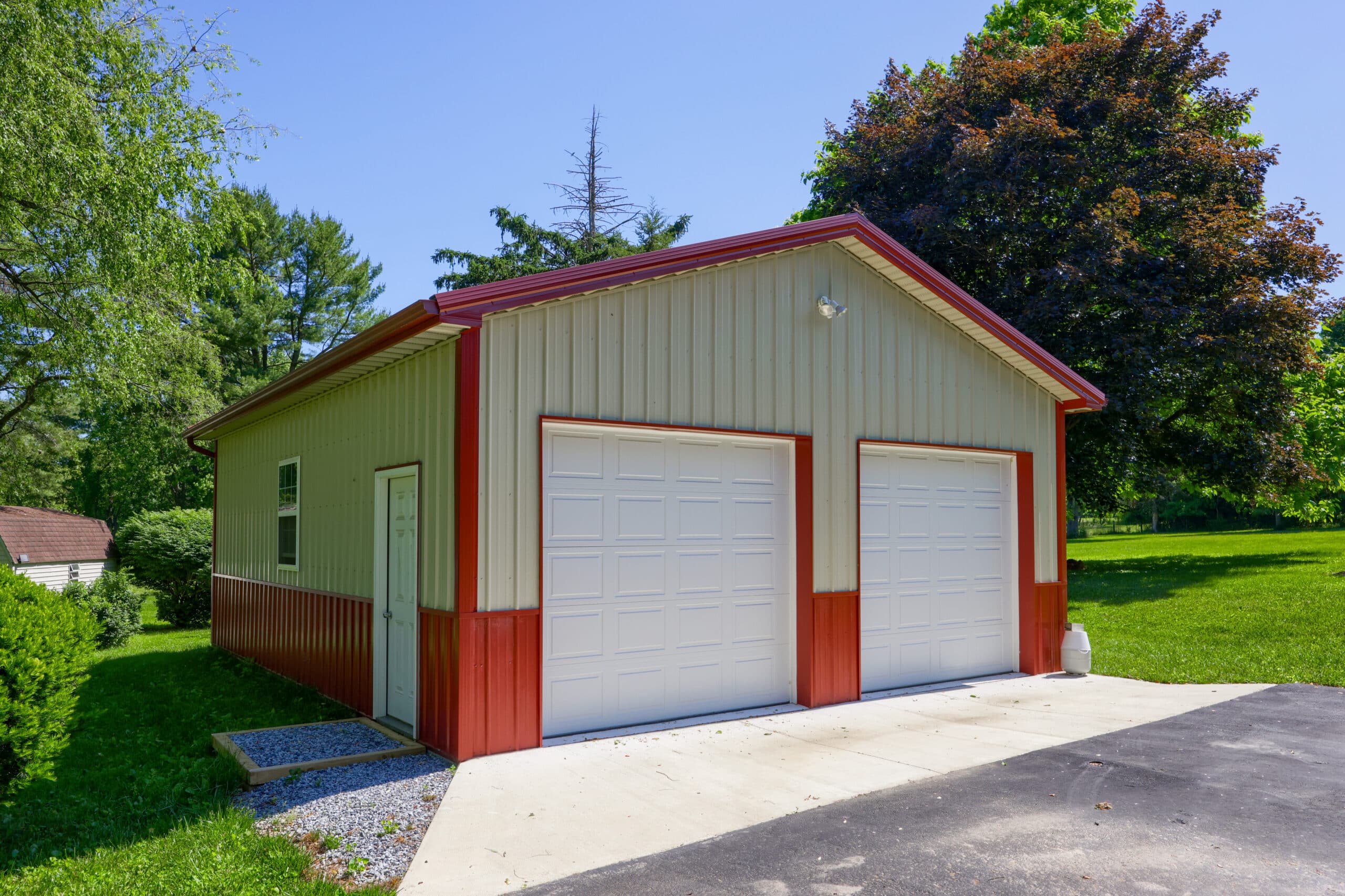 white and red metal two car garage